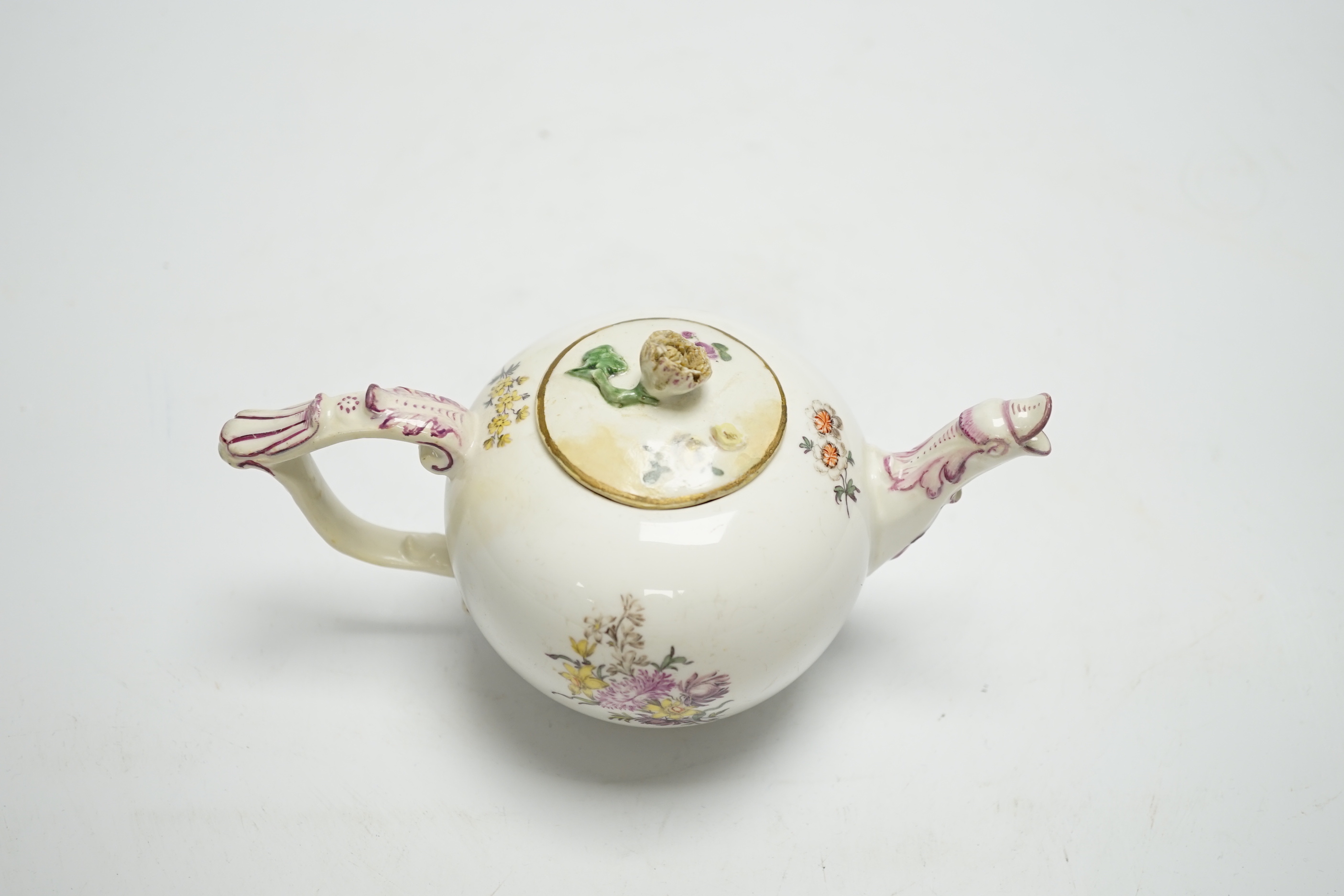 An 18th century Meissen teapot with replacement cover, 10cm